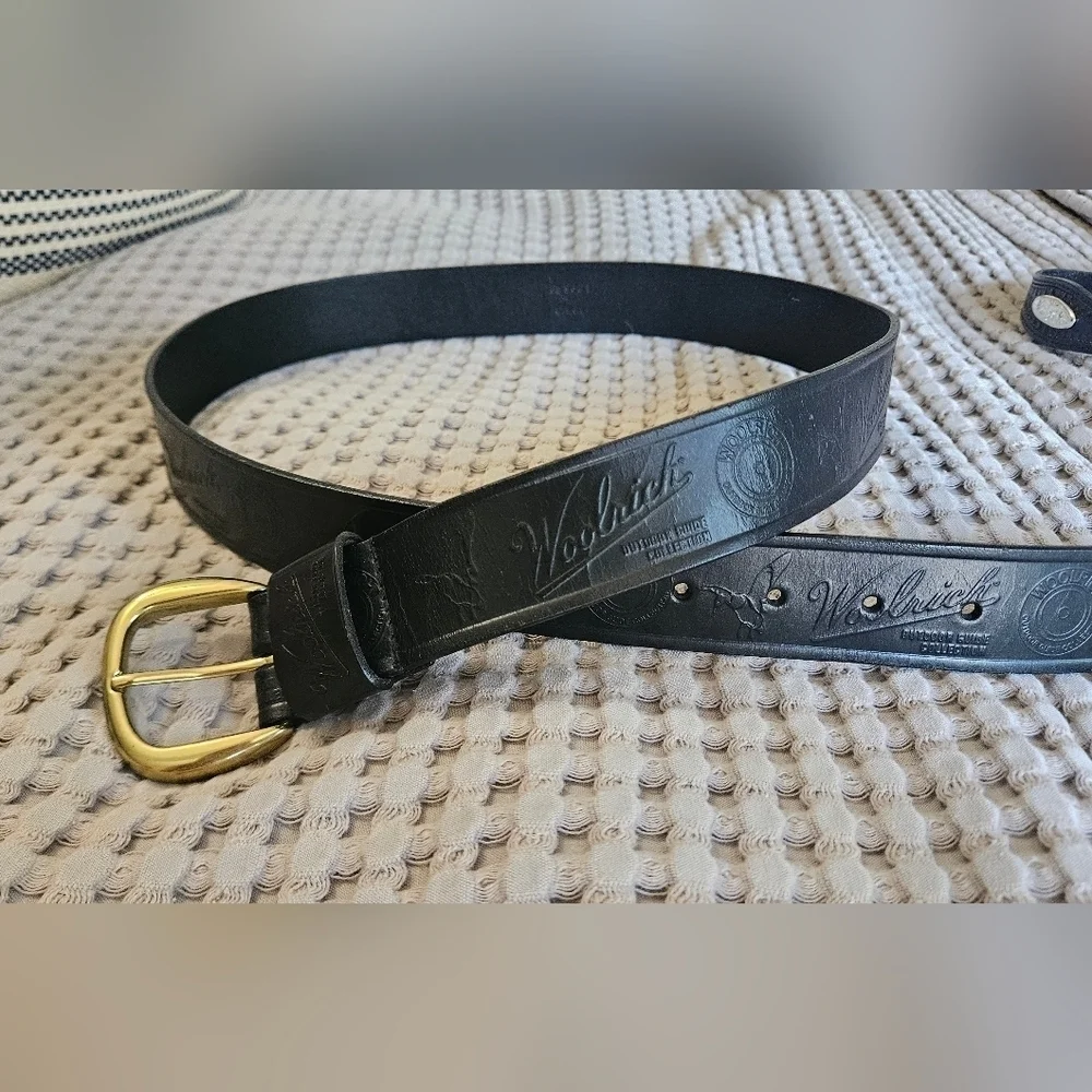 WOOLRICH Outdoor Guide Collection Leather Belt In Black with Gold Buckle.